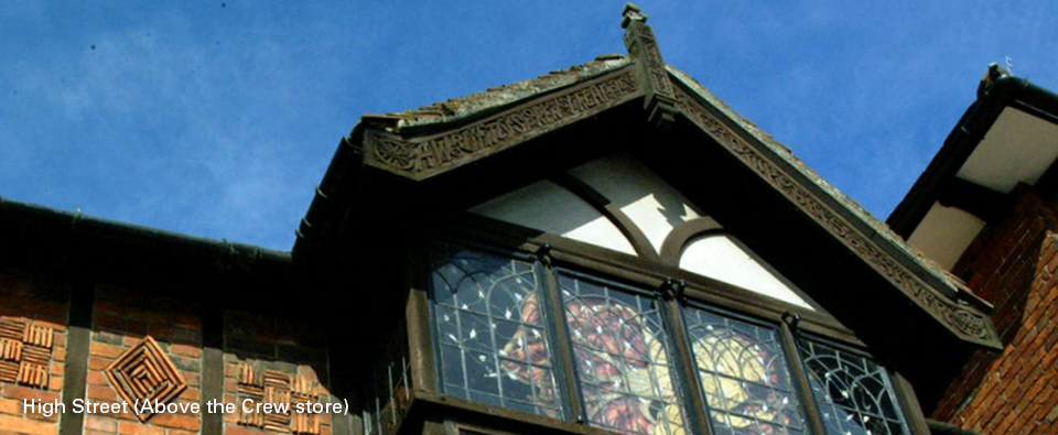 Detail of facade (above Crew) in the High Street